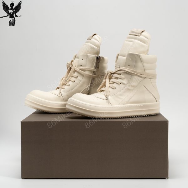 High-top paneled buffed calfskin sneakers in off-white.
